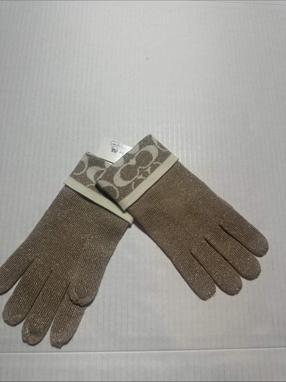 NWT Coach Metallic Glittery Beige Knit Logo Cuff Gloves lightweight - Picture 1 of 5